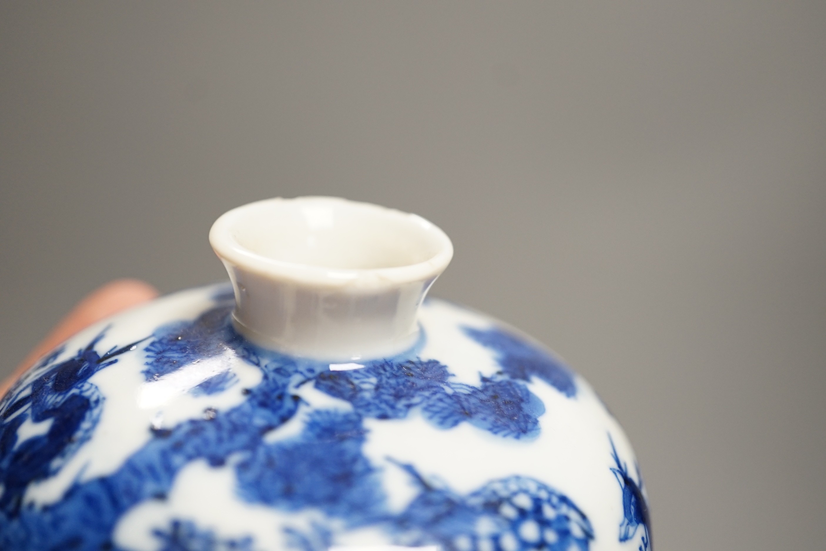 A 19th century Chinese blue and white ‘eight deer’ bowl and cover, ‘man tang fu ji’ mark, 12cm excluding wood stand